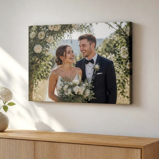 Photo canvas of a bride and groom on a wall