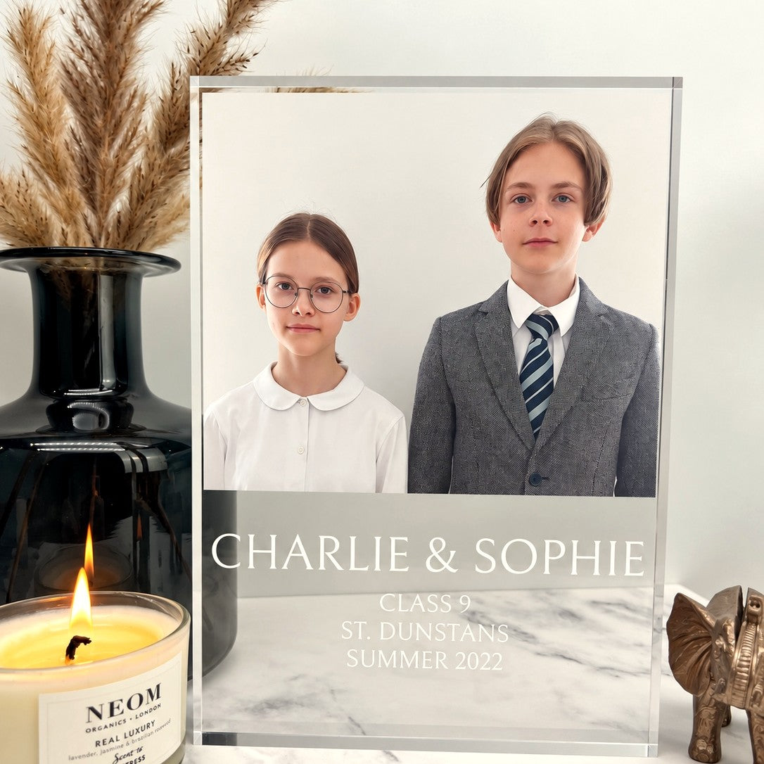 Crystal glass photo block with a brother and sister in school uniform