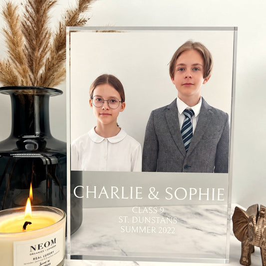 Crystal glass photo block with a brother and sister in school uniform
