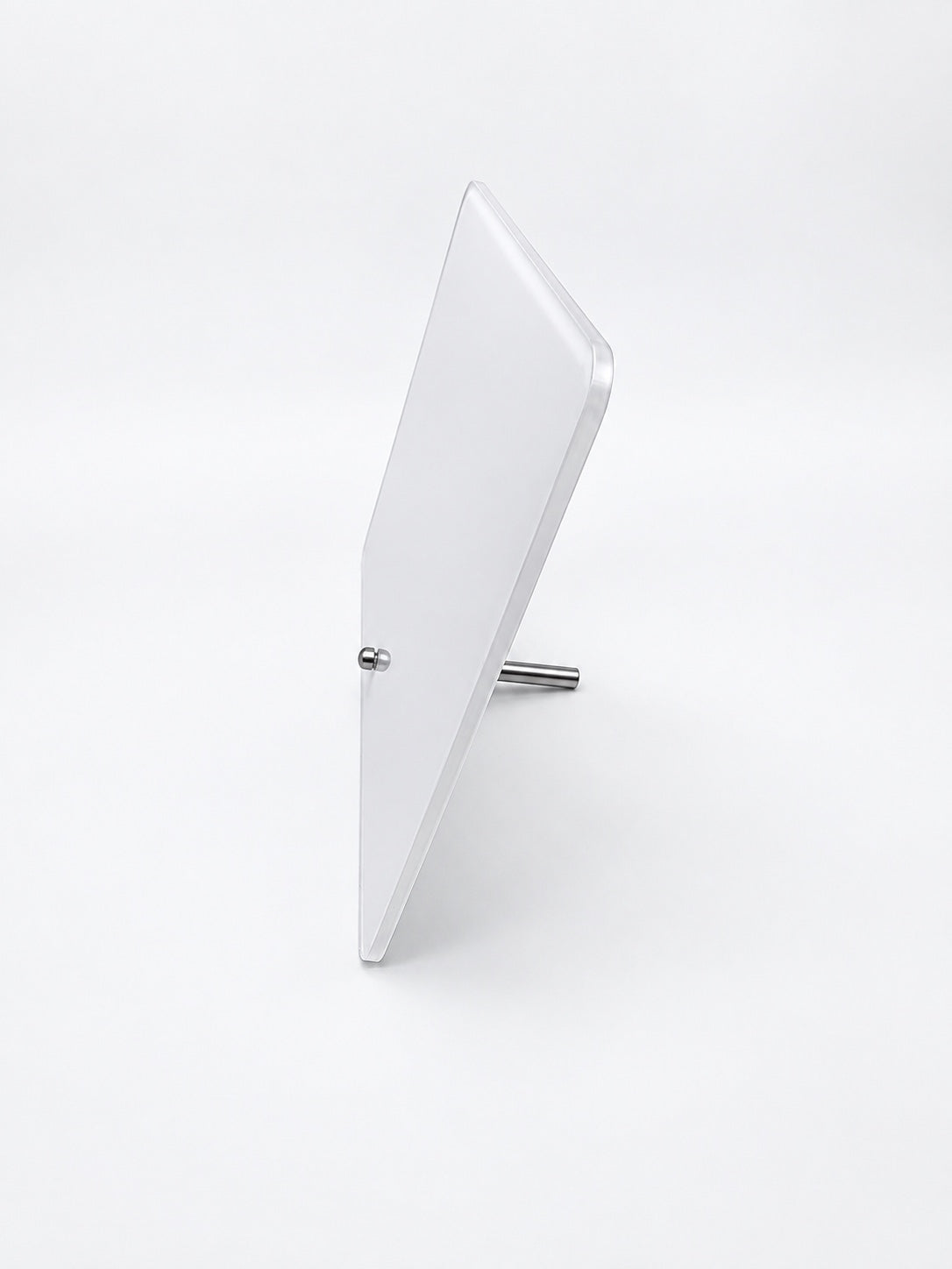 Side view of acrylic photo plaque showing the metal support